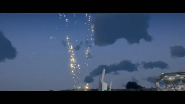 Fireworks over the Grand Senora Raceway grandstands at night in FiveM