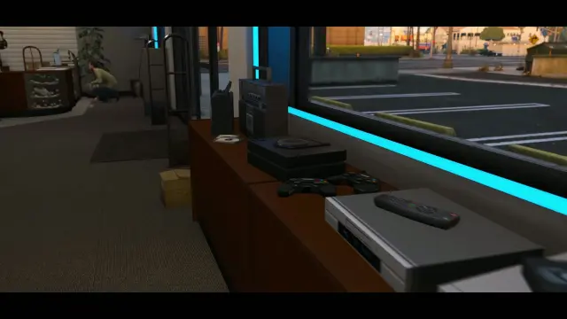 Second-hand consoles and electronics on the counter of the FiveM pawn shop MLO